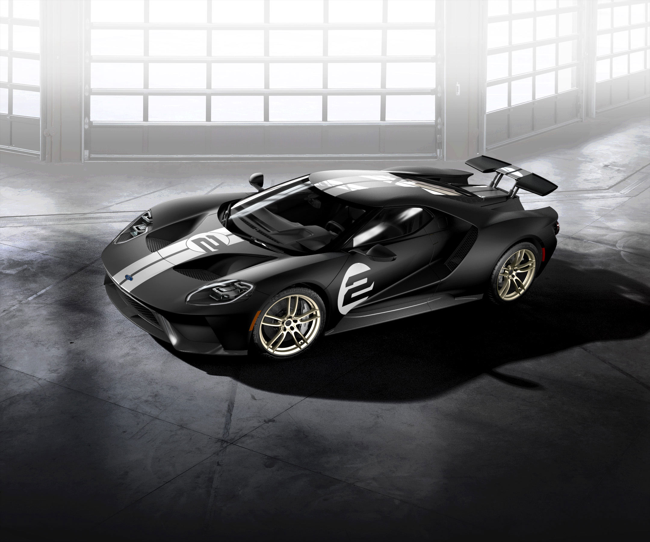 All-new Ford GT '66 Heritage Edition with unique black and silver-stripe livery celebrates 1966 Le Mans-winning GT40 Mark II race car driven by Bruce McLaren and Chris Amon