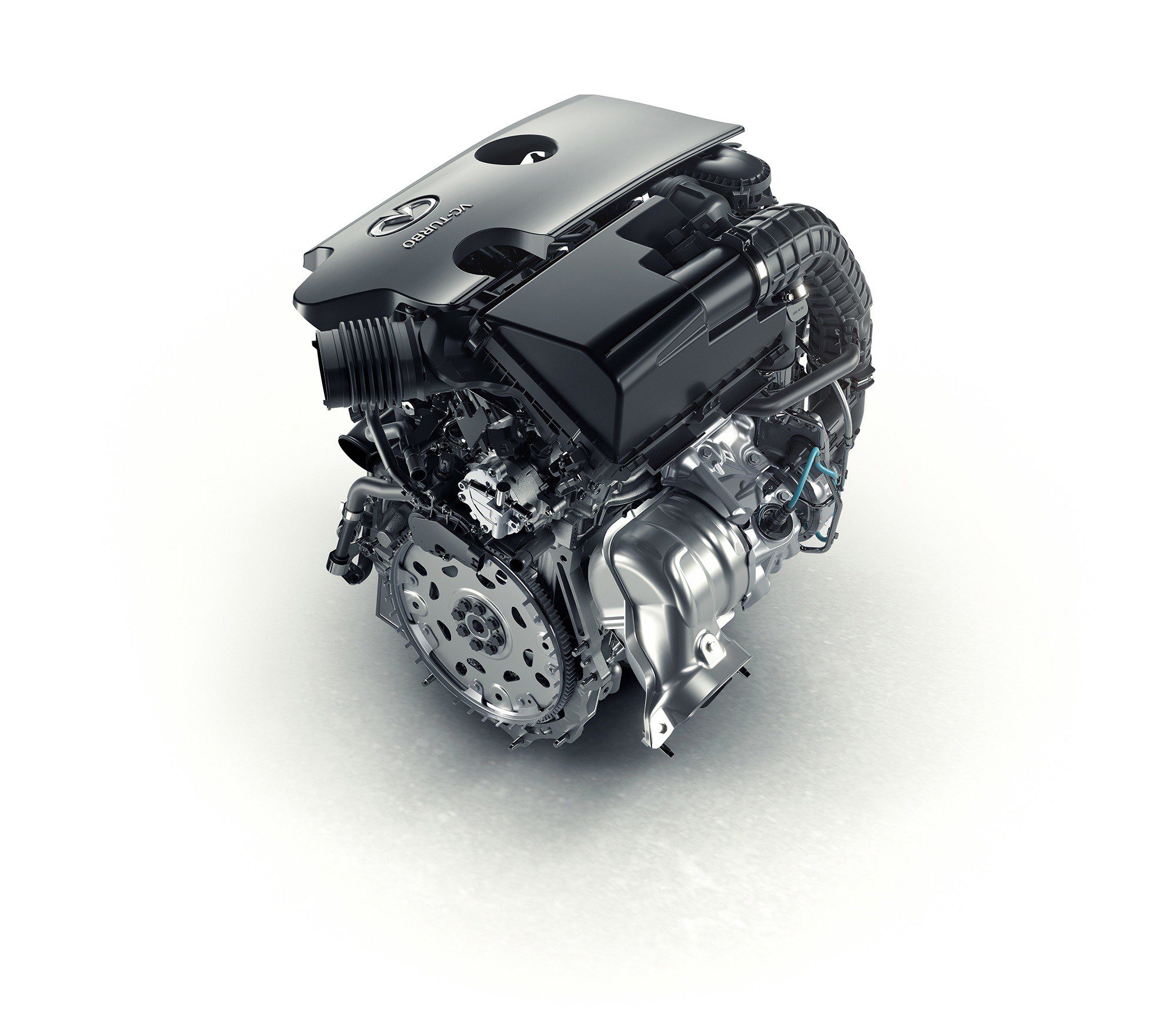 A detailed black car engine isolated on white background.