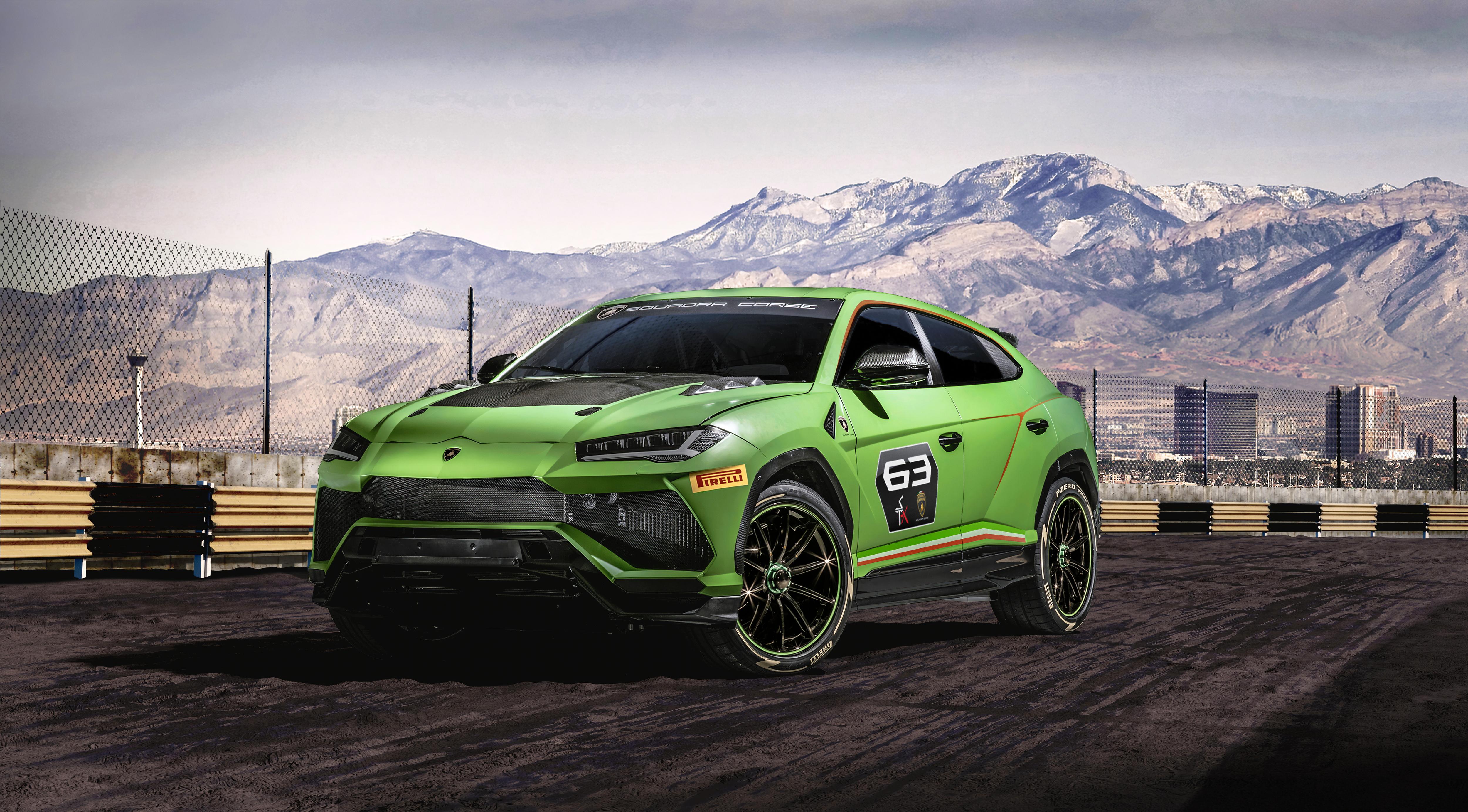 A vibrant green Lamborghini Urus on a mountainous road.