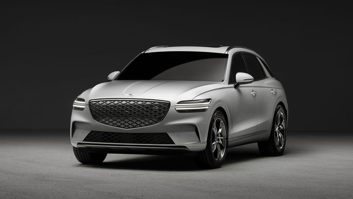 Sleek silver luxury SUV with modern design and distinctive grille.