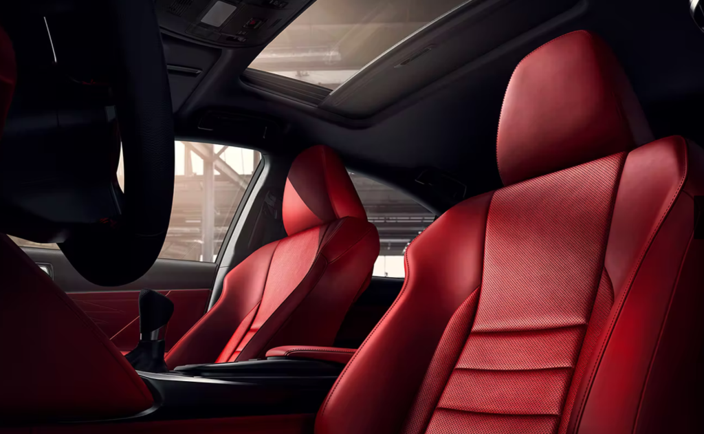 Luxurious interior of the 2023 Lexus IS350 AWD F Sport, showcasing NuLuxe-trimmed seats and advanced infotainment system.