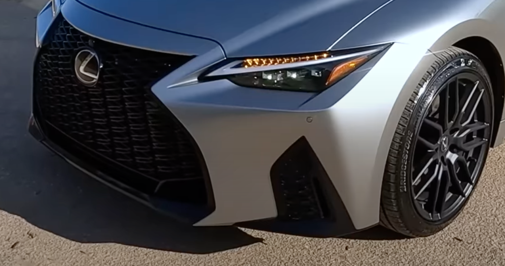 Striking exterior design of the 2023 Lexus IS350 AWD F Sport, featuring bold lines and distinctive L-shaped headlights.