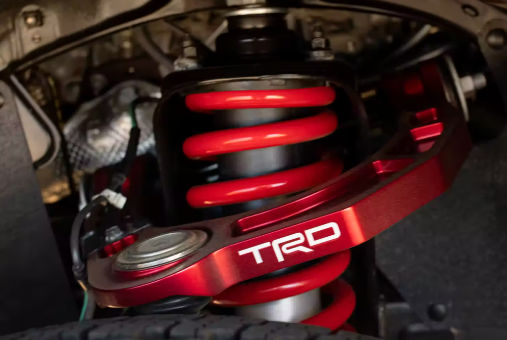 Tacoma TRD Pro: FOX 2.5-inch Internal Bypass Shocks and Lifted Suspension for Superior Off-Road Performance.