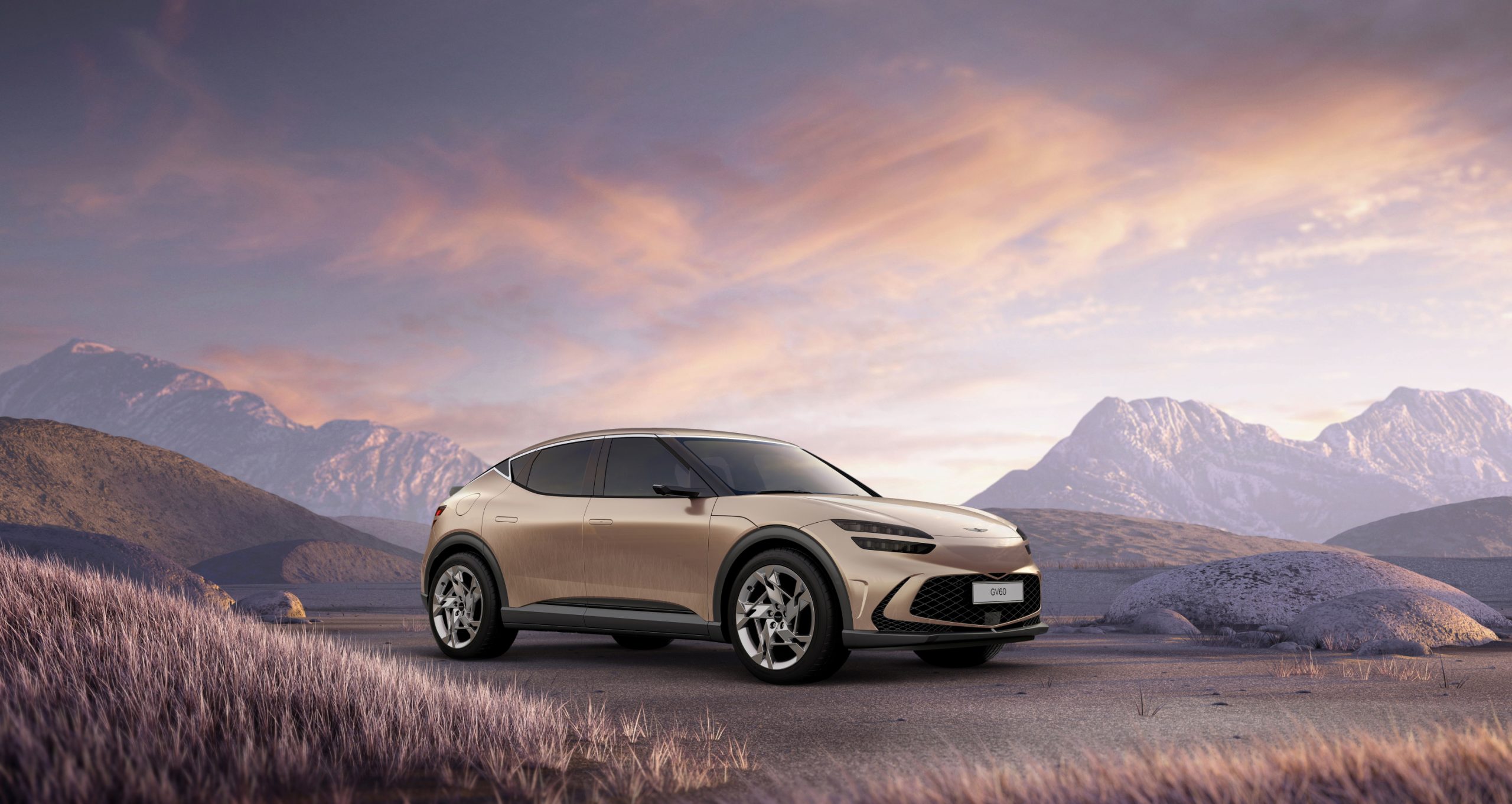 A sleek modern electric SUV parked on a scenic plateau at sunset.