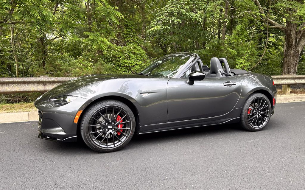 2023, Mazda MX-5 Miata Club, sports car, convertible, SKYACTIV-G, rear-wheel drive, manual transmission, Bilstein dampers, limited-slip differential, Brembo brakes, 17-inch alloy wheels, Apple CarPlay, Android Auto, Bose audio system, LED headlights, heated seats, keyless entry, blind-spot monitoring, rear cross-traffic alert