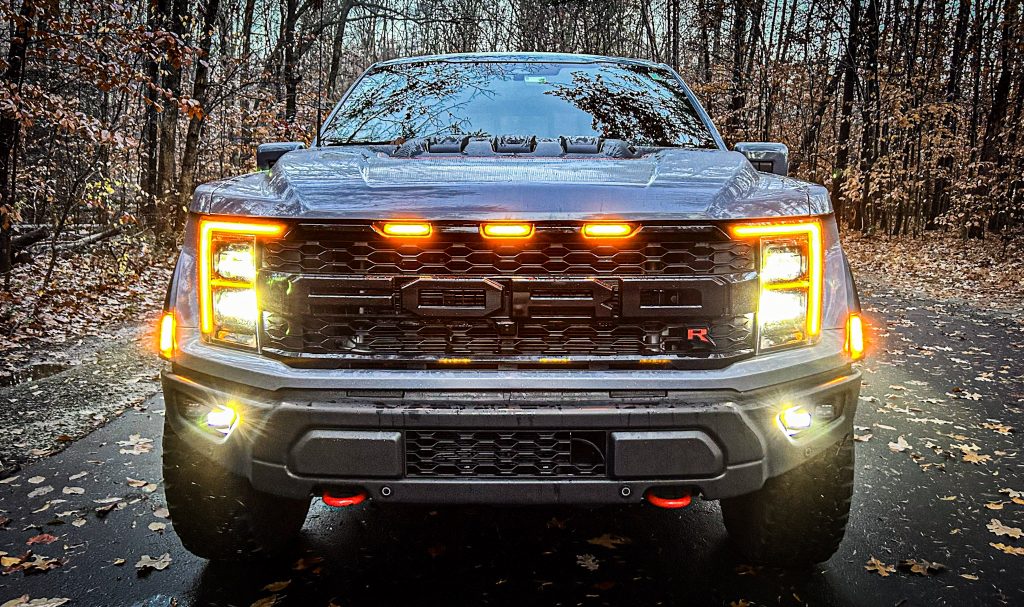 Explore the ultimate off-road truck, the 2023 Ford F-150 Raptor R: unparalleled power, design, and off-road technology via Carsfera.com
