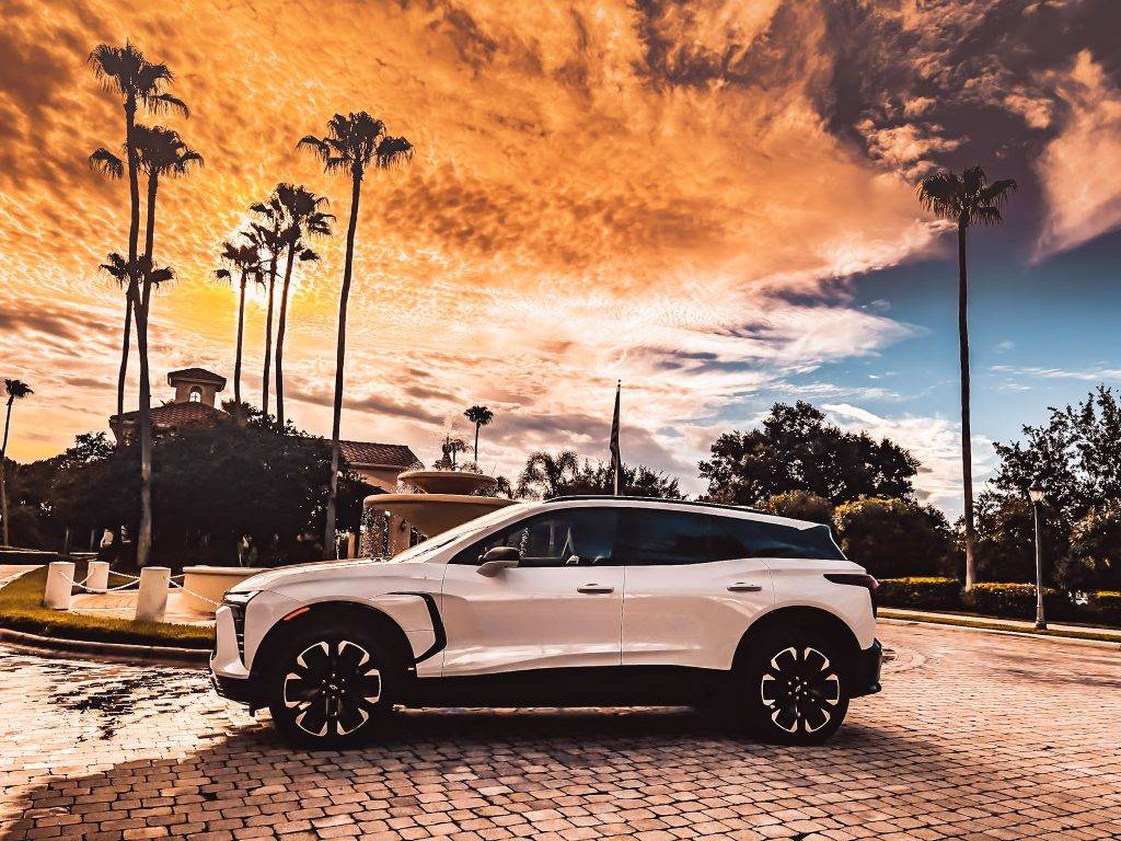 2024 Chevrolet Blazer EV RS AWD cruising through sunny Florida. Visit Carsfera.com