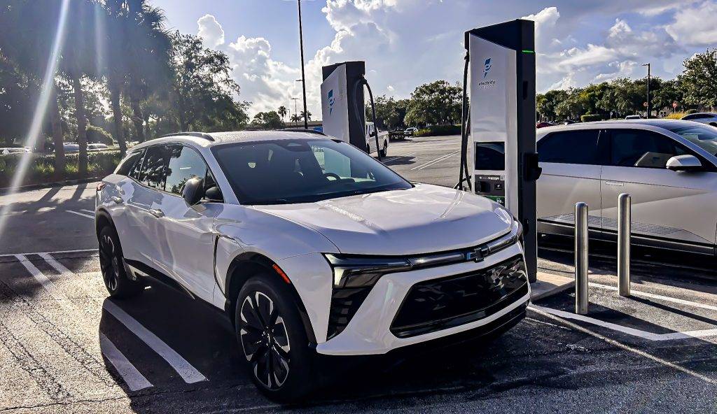 2024 Chevrolet Blazer EV RS AWD cruising through sunny Florida. Visit Carsfera.com