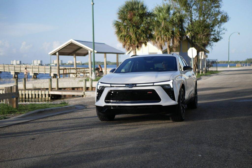 2024 Chevrolet Blazer EV RS AWD cruising through sunny Florida. Visit Carsfera.com