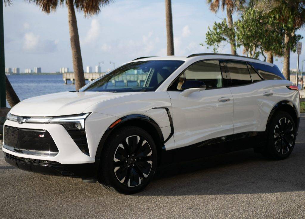 2024 Chevrolet Blazer EV RS AWD cruising through sunny Florida. Visit Carsfera.com