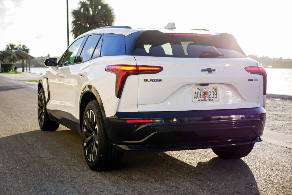 2024 Chevrolet Blazer EV RS AWD cruising through sunny Florida. Visit Carsfera.com