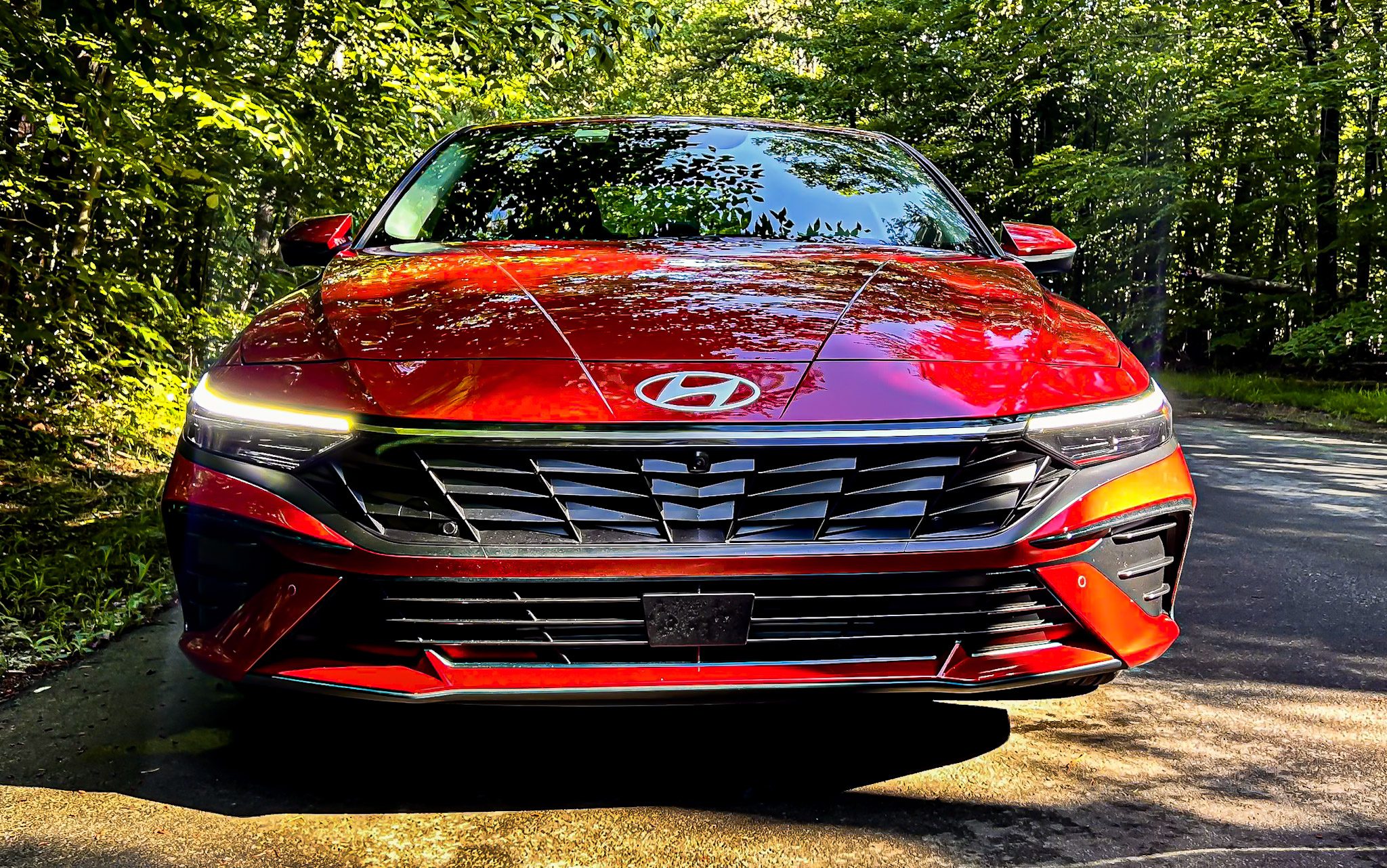 View detailed images of the 2024 Hyundai Elantra Limited, showcasing its sleek design, advanced features, and stylish interior on Carsfera.com