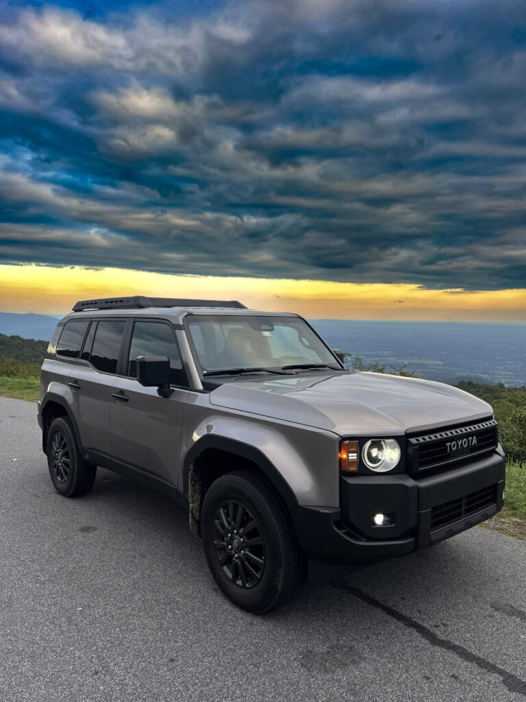 2024 Toyota Land Cruiser 1958 Edition SUV showcasing its rugged design, heritage-inspired details, and modern features, including LED headlights, boxy silhouette, and retro-styled grille. Perfect for off-road adventures and everyday driving.