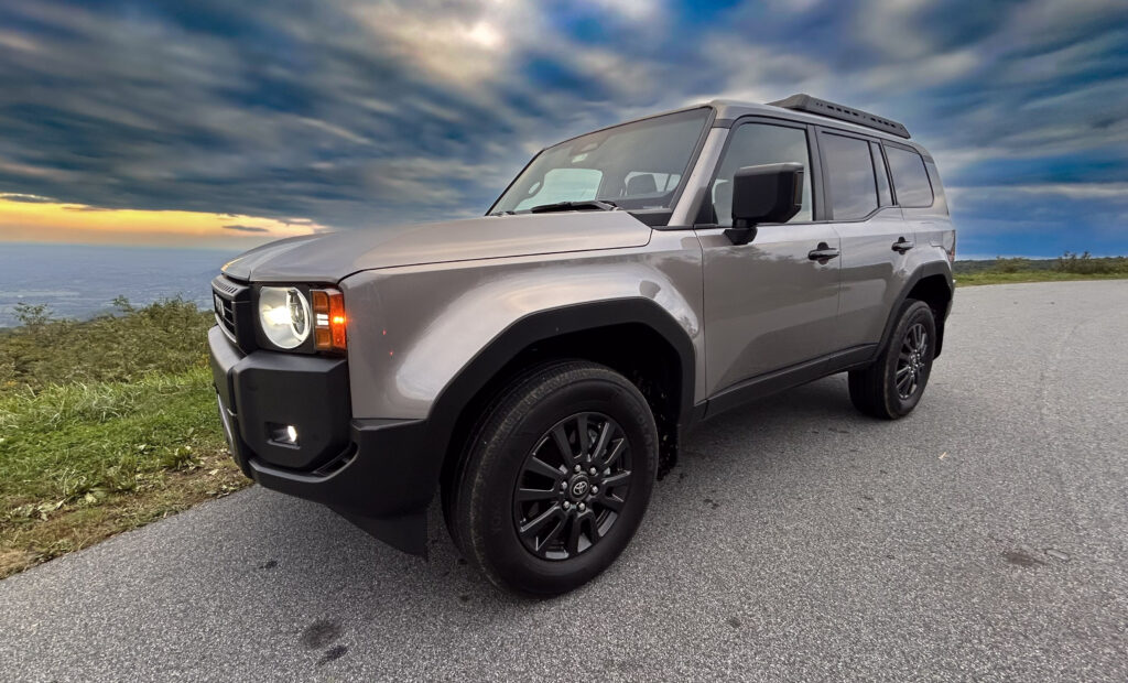 2024 Toyota Land Cruiser 1958 Edition SUV showcasing its rugged design, heritage-inspired details, and modern features, including LED headlights, boxy silhouette, and retro-styled grille. Perfect for off-road adventures and everyday driving.