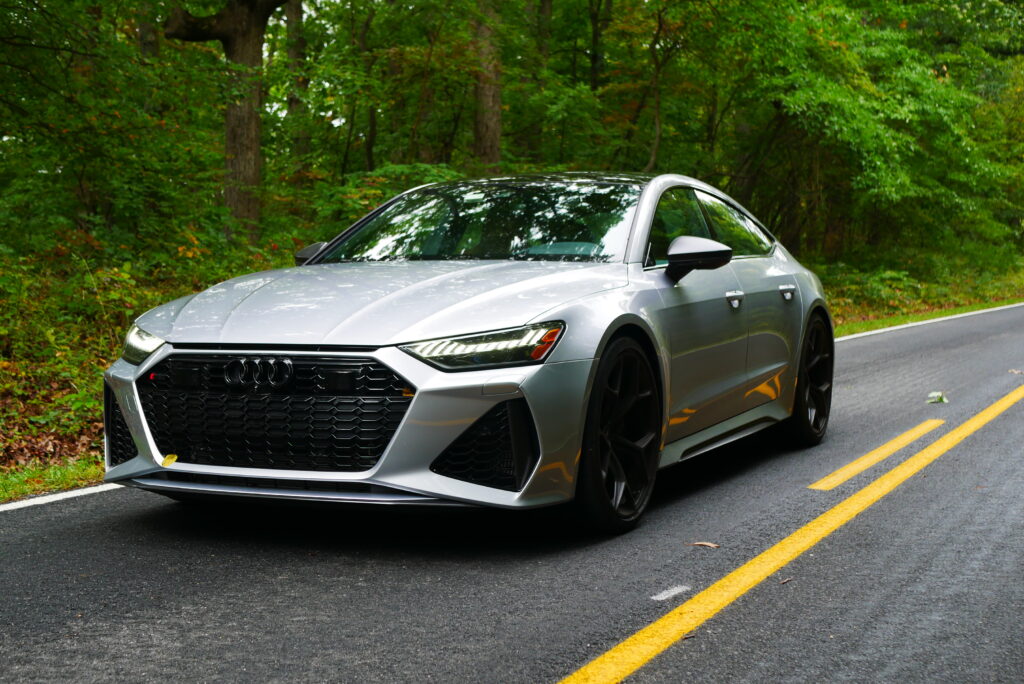 Images of the 2024 Audi RS 7 highlighting its sleek exterior design, powerful performance, luxurious interior, and advanced technology.