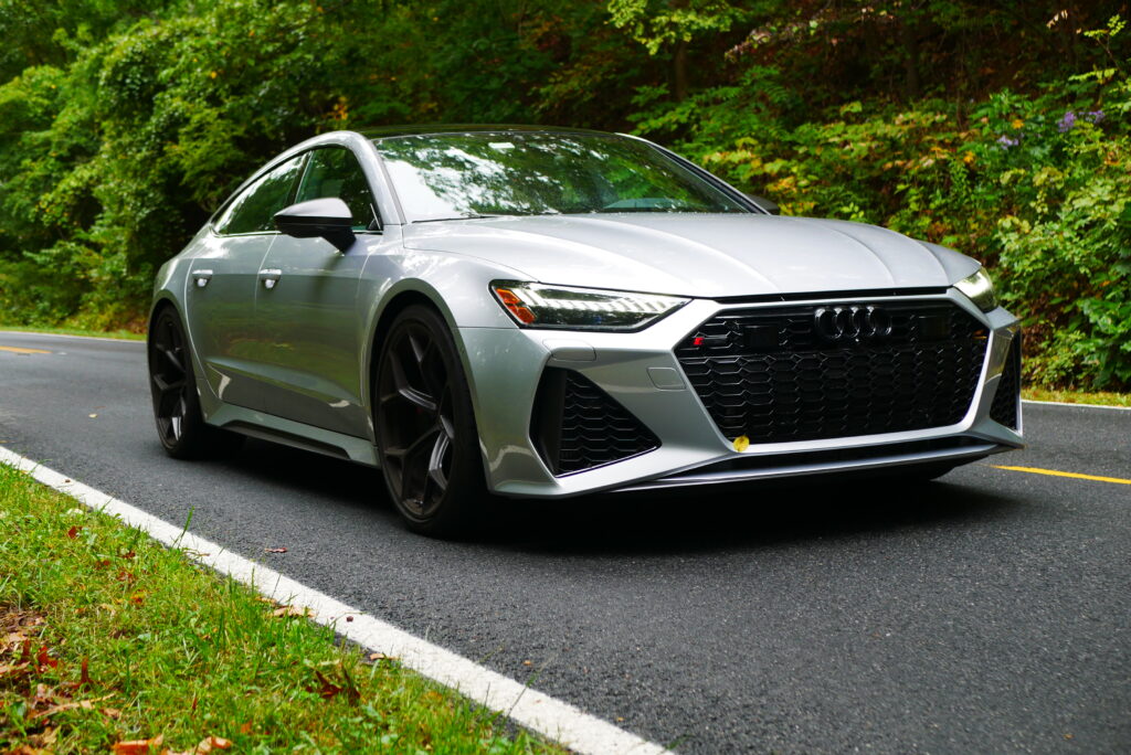 Images of the 2024 Audi RS 7 highlighting its sleek exterior design, powerful performance, luxurious interior, and advanced technology.