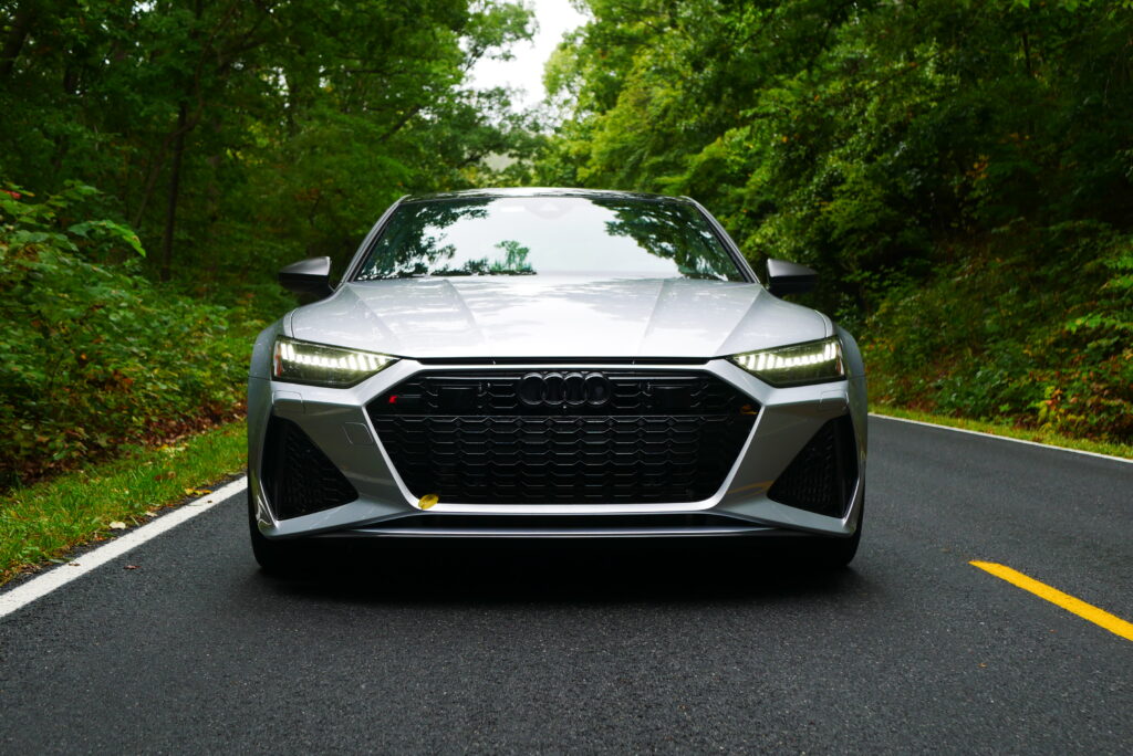 Images of the 2024 Audi RS 7 highlighting its sleek exterior design, powerful performance, luxurious interior, and advanced technology.