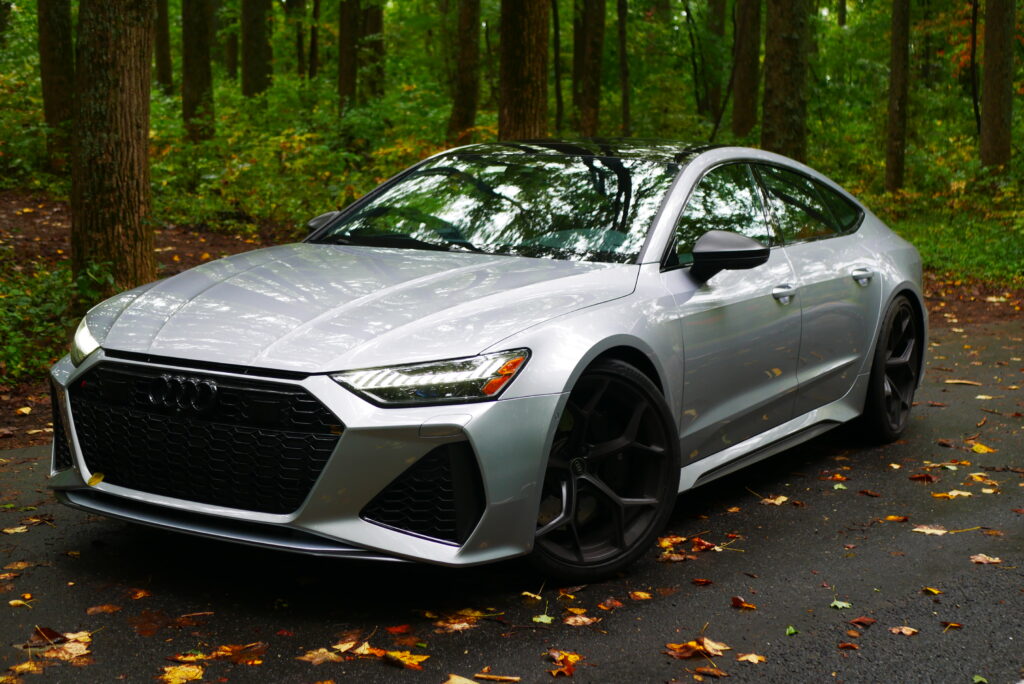 Images of the 2024 Audi RS 7 highlighting its sleek exterior design, powerful performance, luxurious interior, and advanced technology.