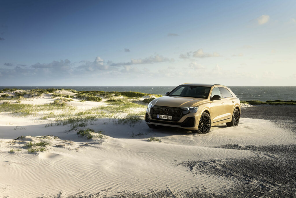 A stylish 2024 Audi Q8 55 TFSI Quattro luxury SUV showcasing its bold exterior design, high-tech interior, and performance features.