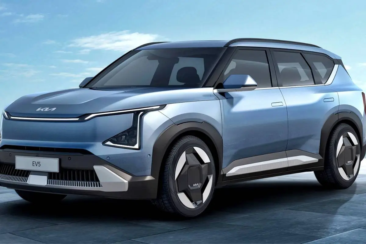 Sleek silver electric SUV with modern design and aerodynamic features.