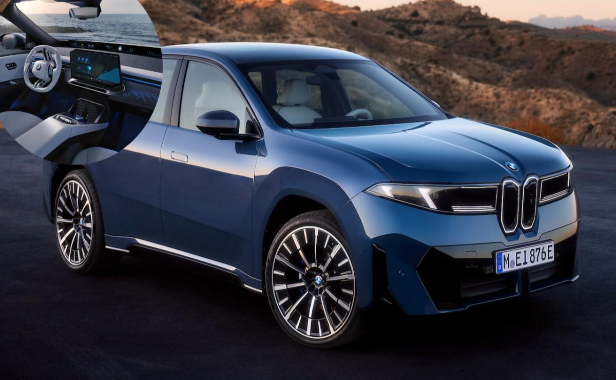 A sleek blue electric SUV parked on a scenic road during sunset.
