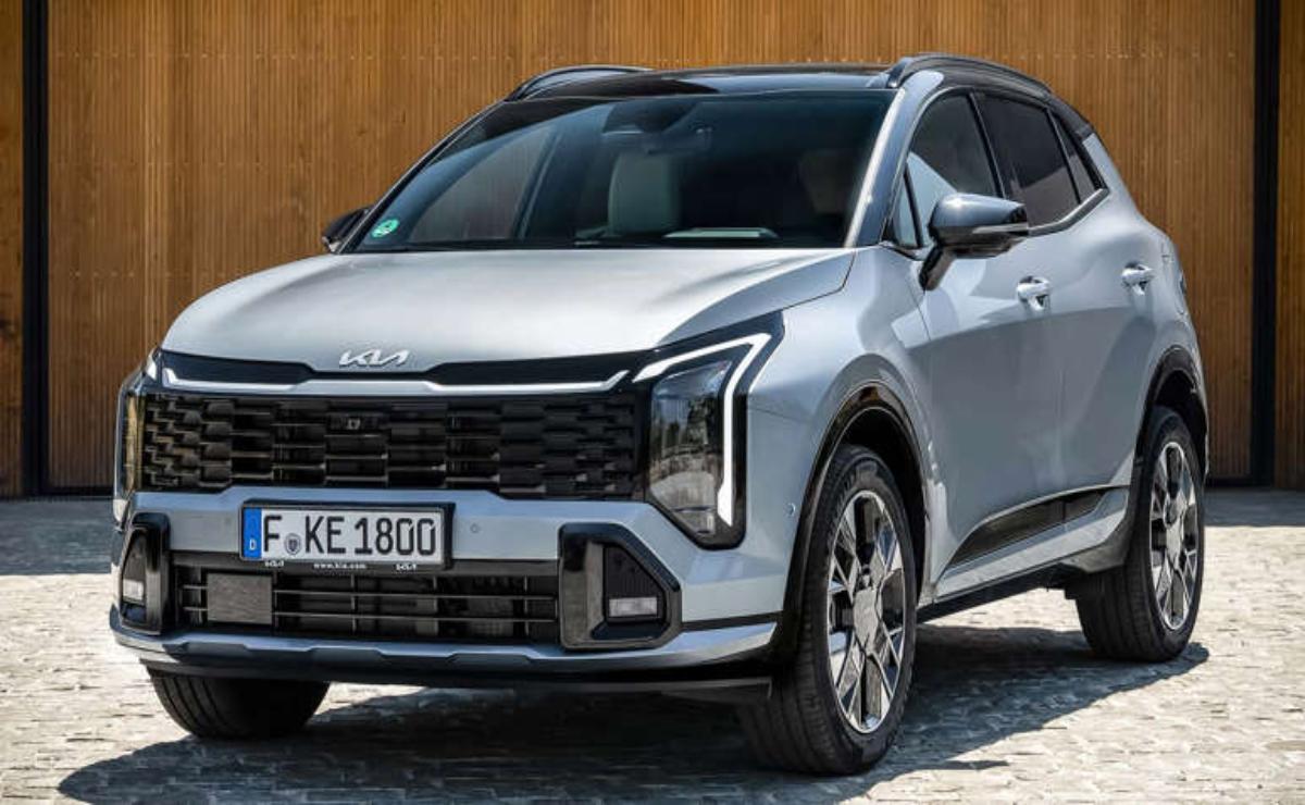 Silver modern SUV parked outside with sleek design and distinct front lights.