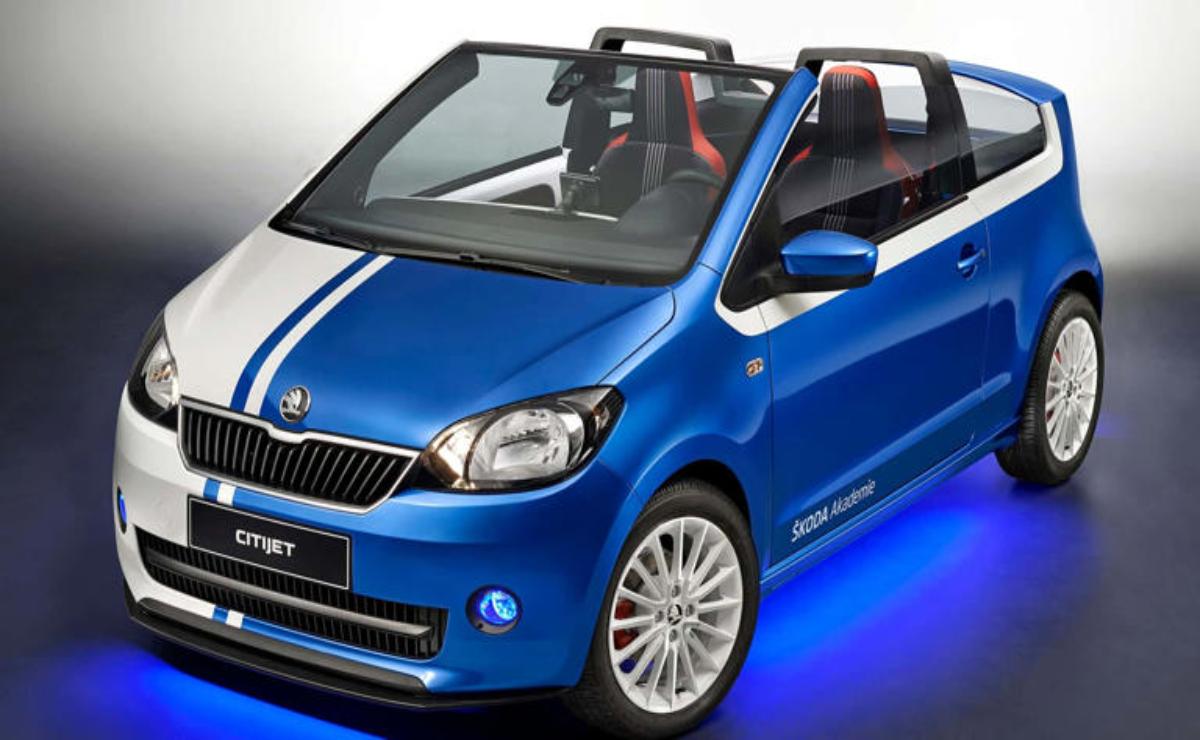Blue convertible car with stylish design and glowing underbody lights.