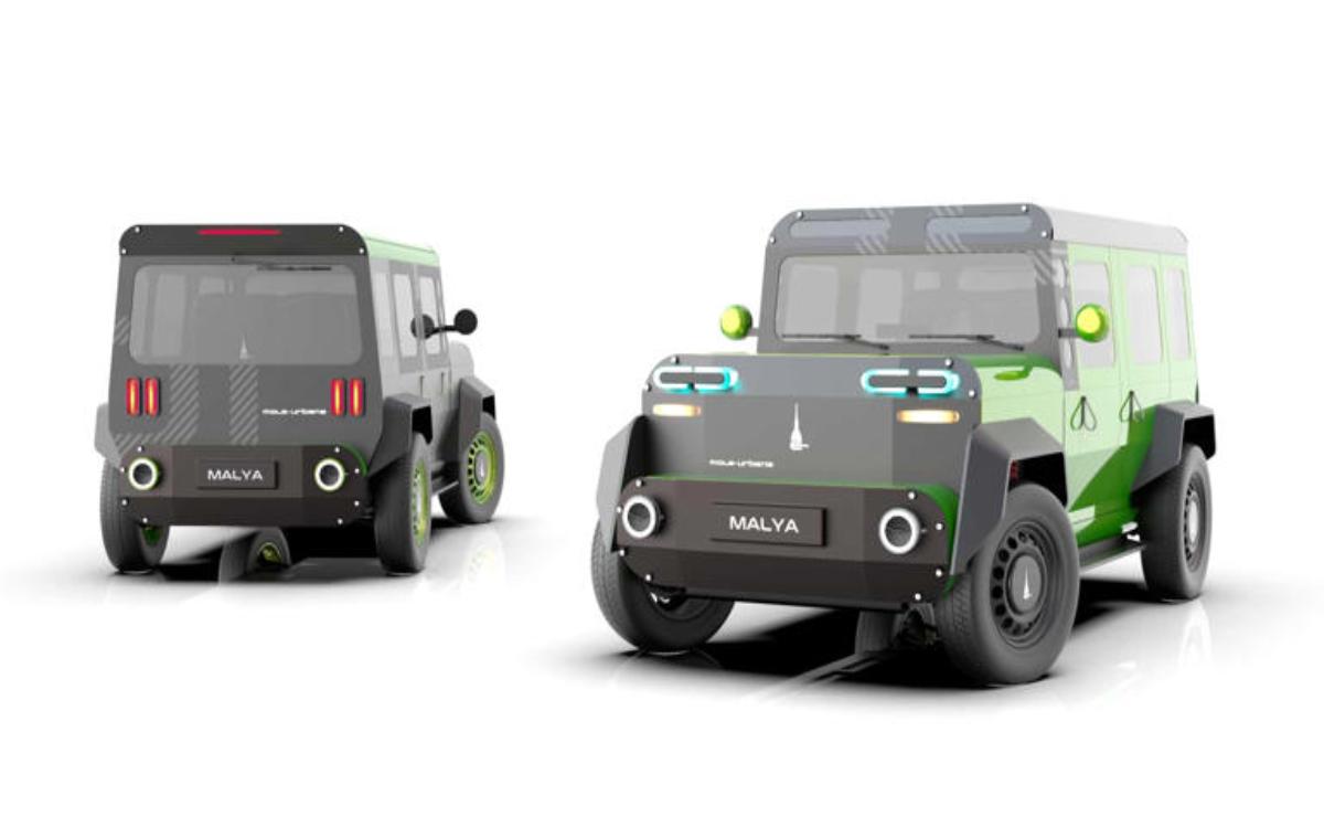 Compact futuristic electric vehicle with a sleek, boxy design shown from front and rear views.