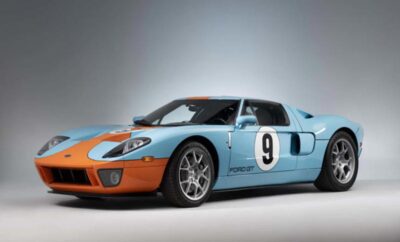 Classic blue and orange race car with number 9 on the side.