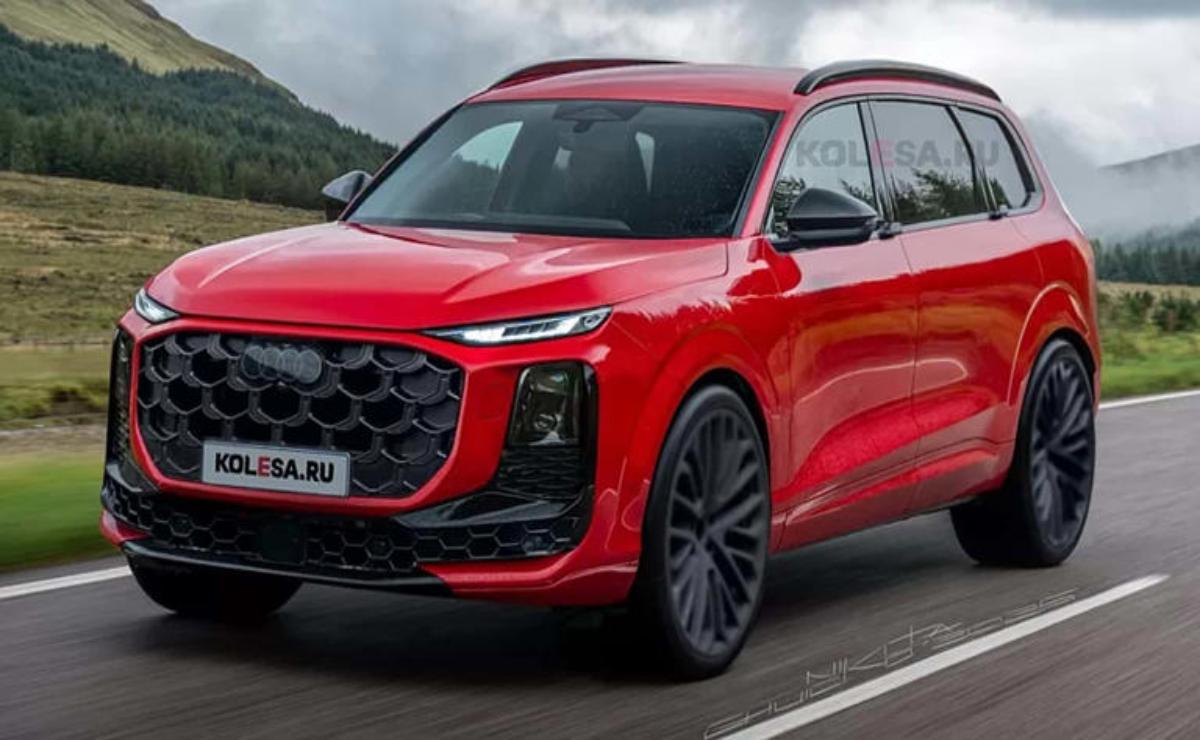 Red Audi Q5 driving on a scenic road.