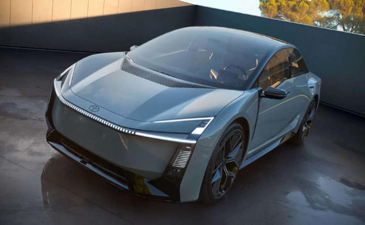 Sleek modern electric car in silver on display.