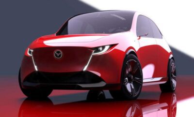 Futuristic red electric car with sleek design and sharp LED headlights.