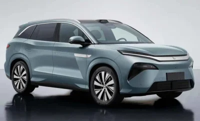 A sleek modern electric SUV in a silver-blue shade.