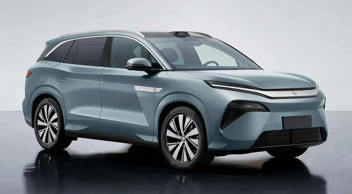 A sleek modern electric SUV in a silver-blue shade.