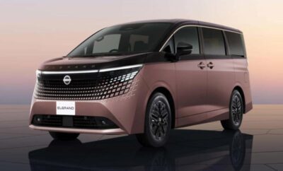 Modern Nissan minivan with sleek design and unique grille pattern.