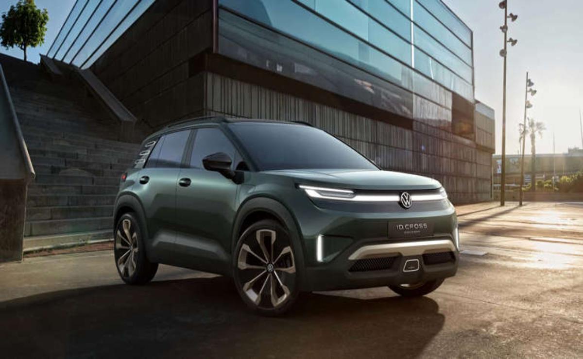 A sleek, modern electric SUV parked outside a glass building.