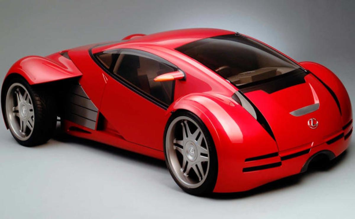 Sleek red sports car with black accents and modern design.