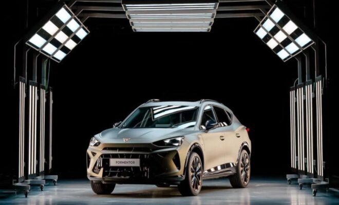 A sleek, modern SUV showcased against a dark background.