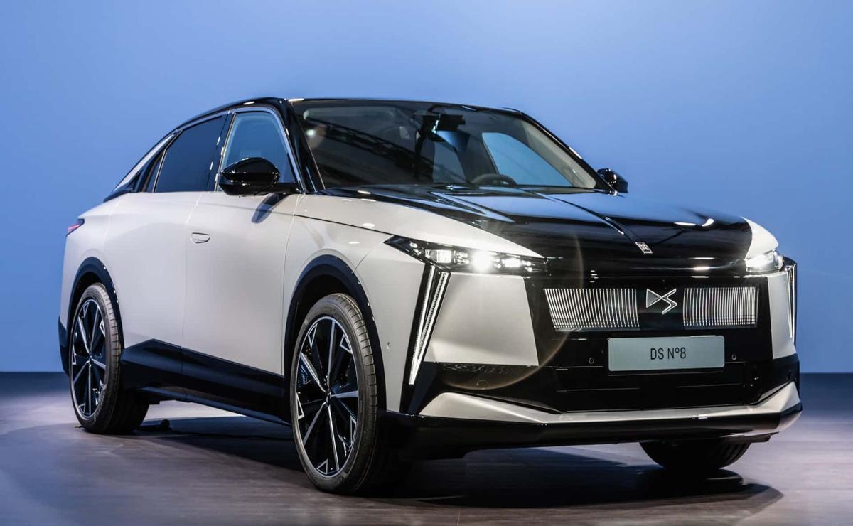 Sleek white electric SUV with modern design and black accents.