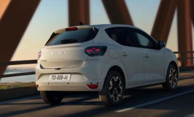 White Renault car on a bridge during sunset.