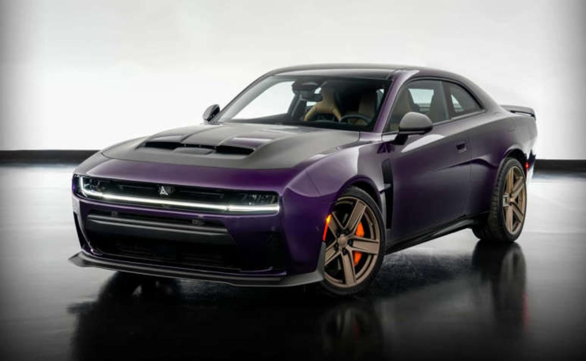 A sleek purple Dodge Challenger with orange brake calipers.