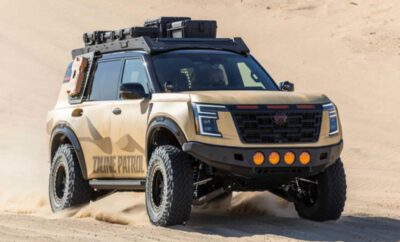 Rugged off-road vehicle with roof rack and front lights.