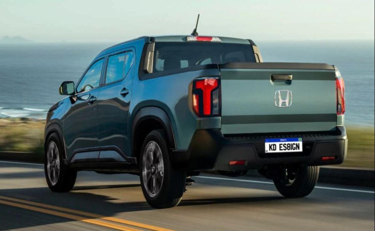 Rear view of a modern black pickup truck parked outdoors.