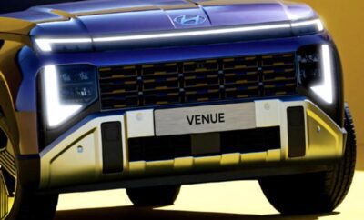 Close-up of a Hyundai Venue front grille and license plate.