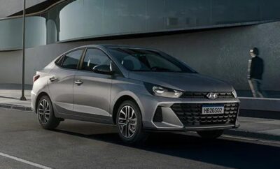 A sleek gray Hyundai sedan parked near a modern building.