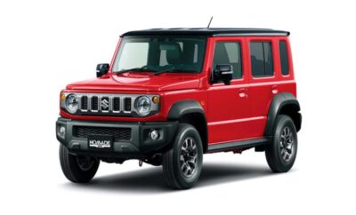Red compact SUV with black accents and rugged design.