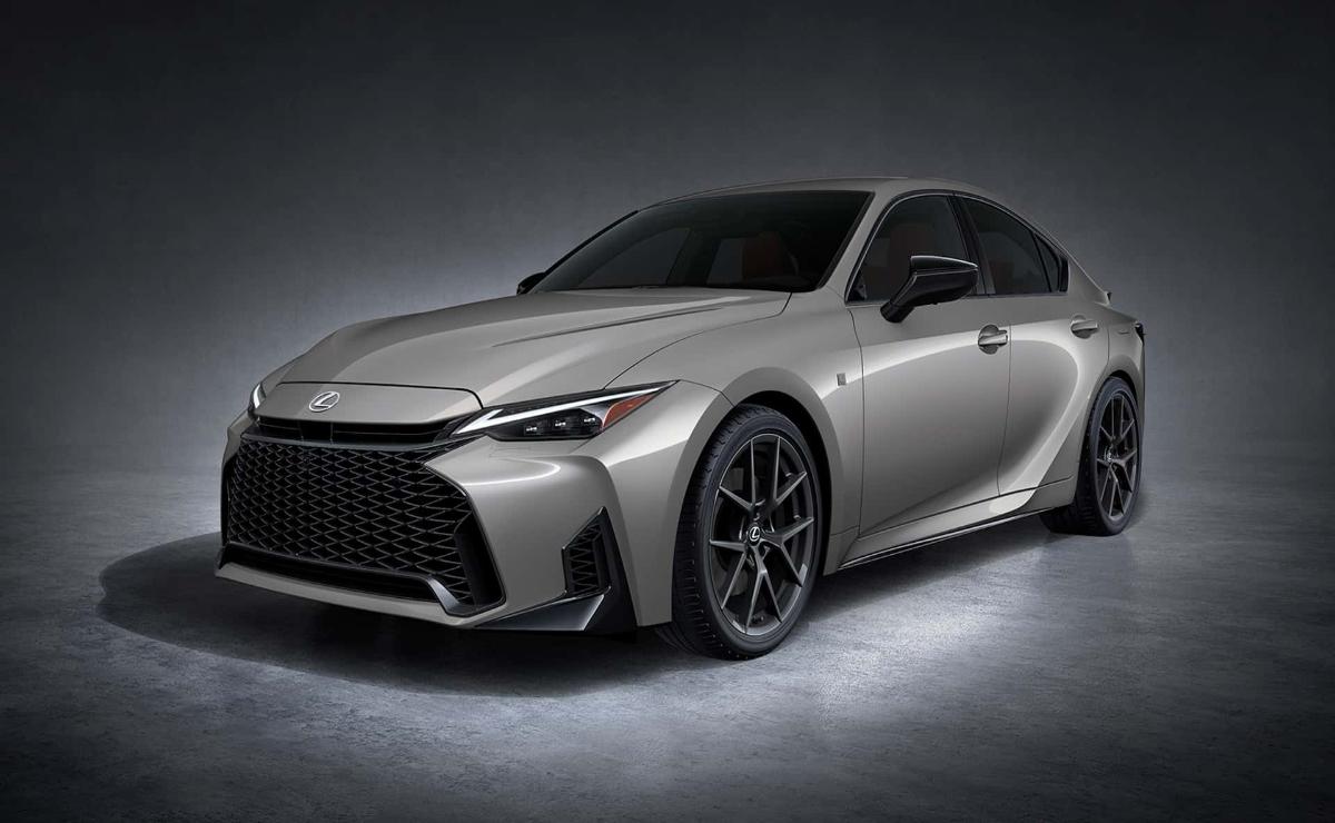 Sleek silver luxury sedan with sporty design and aggressive front grille.