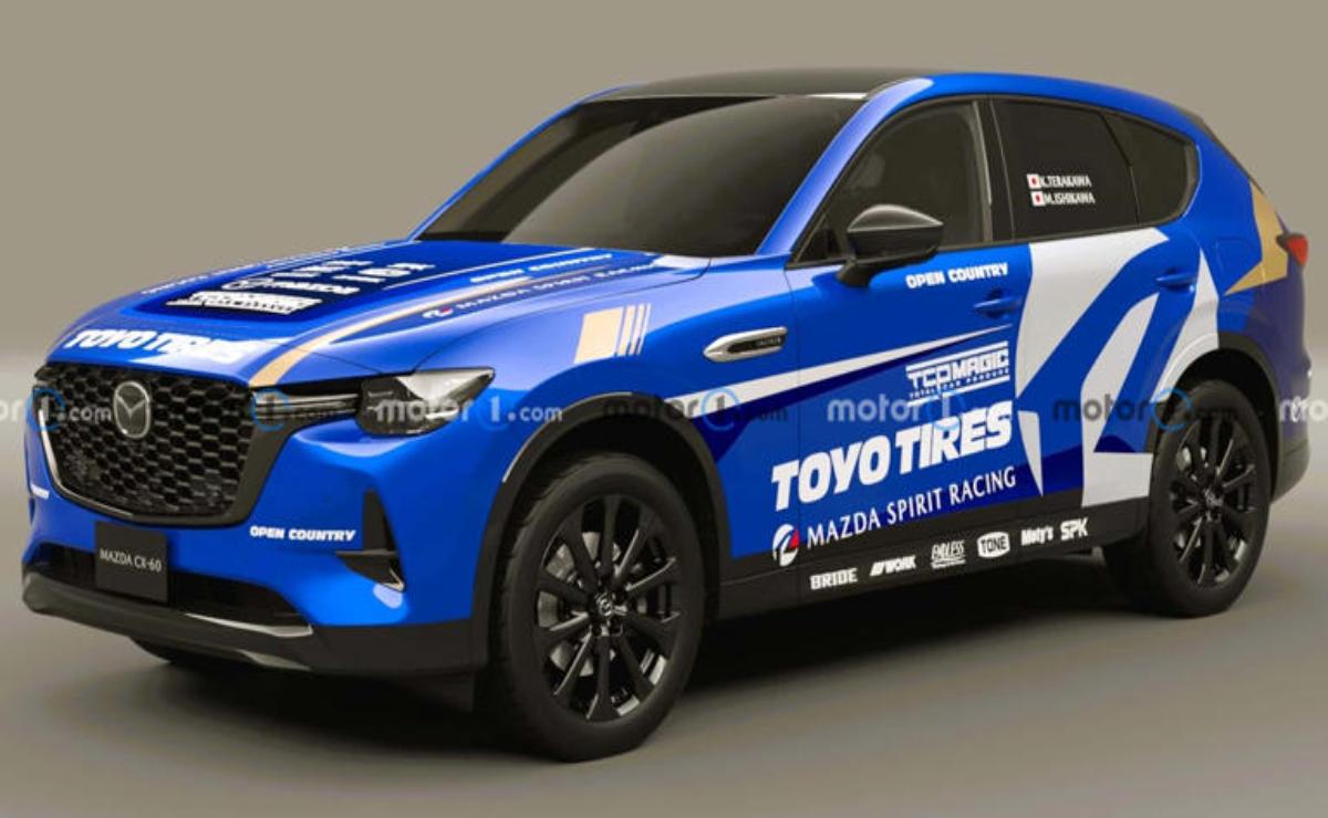 Blue racing car with Toyo Tires branding and sponsor logos.