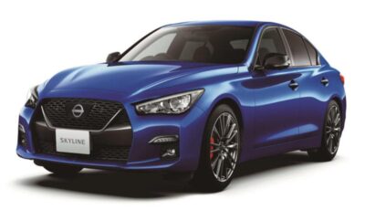 A sleek blue Nissan sports sedan with modern design.