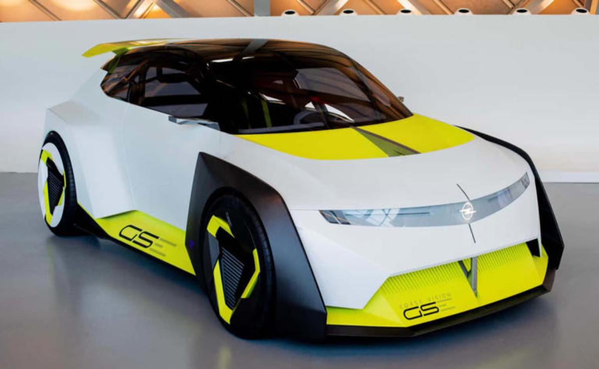 Futuristic white and yellow electric concept car with sleek design.